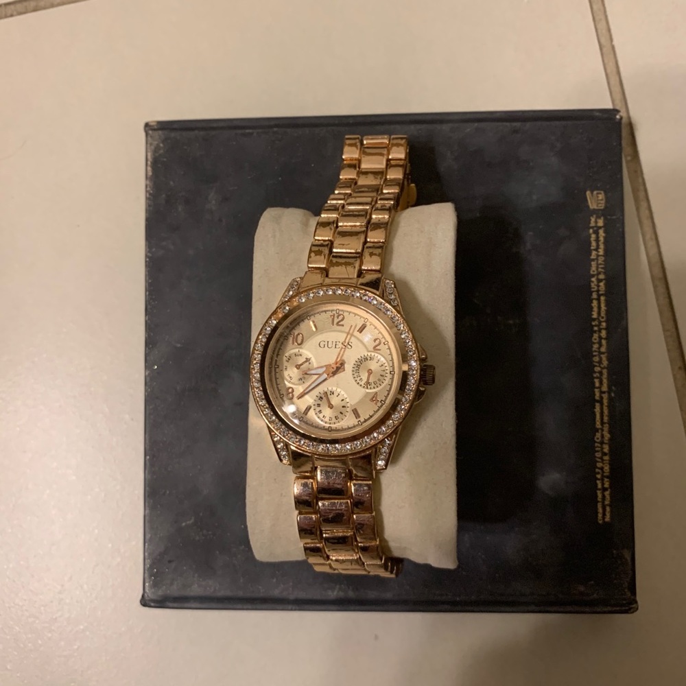 Rose gold guess watch
